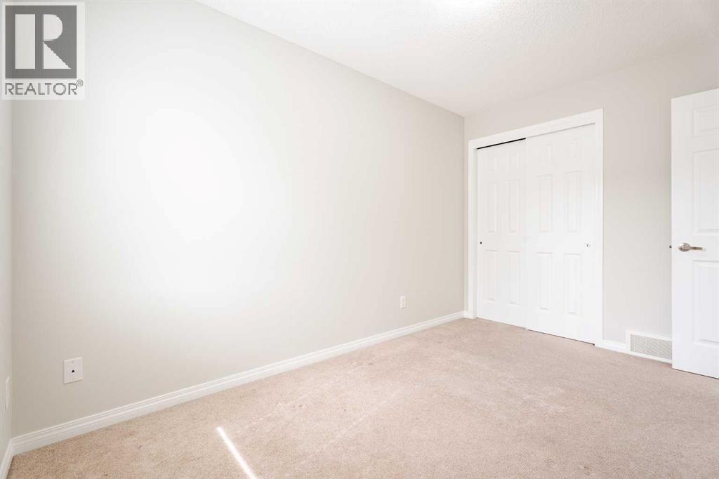 3005 Windsong Boulevard Sw, Airdrie, AB - Indoor Photo Showing Other Room
