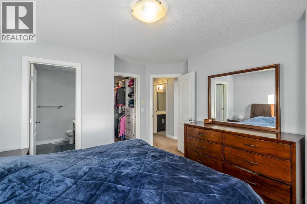 254 Silverado Plains Circle Sw, Calgary, AB - Indoor Photo Showing Bedroom