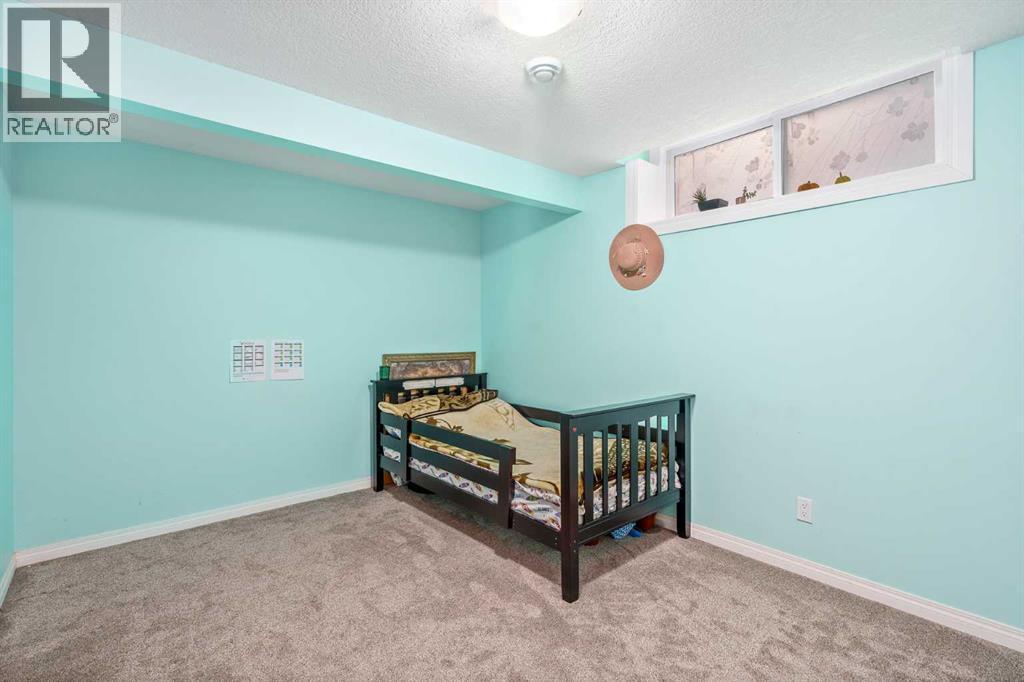 254 Silverado Plains Circle Sw, Calgary, AB - Indoor Photo Showing Bedroom