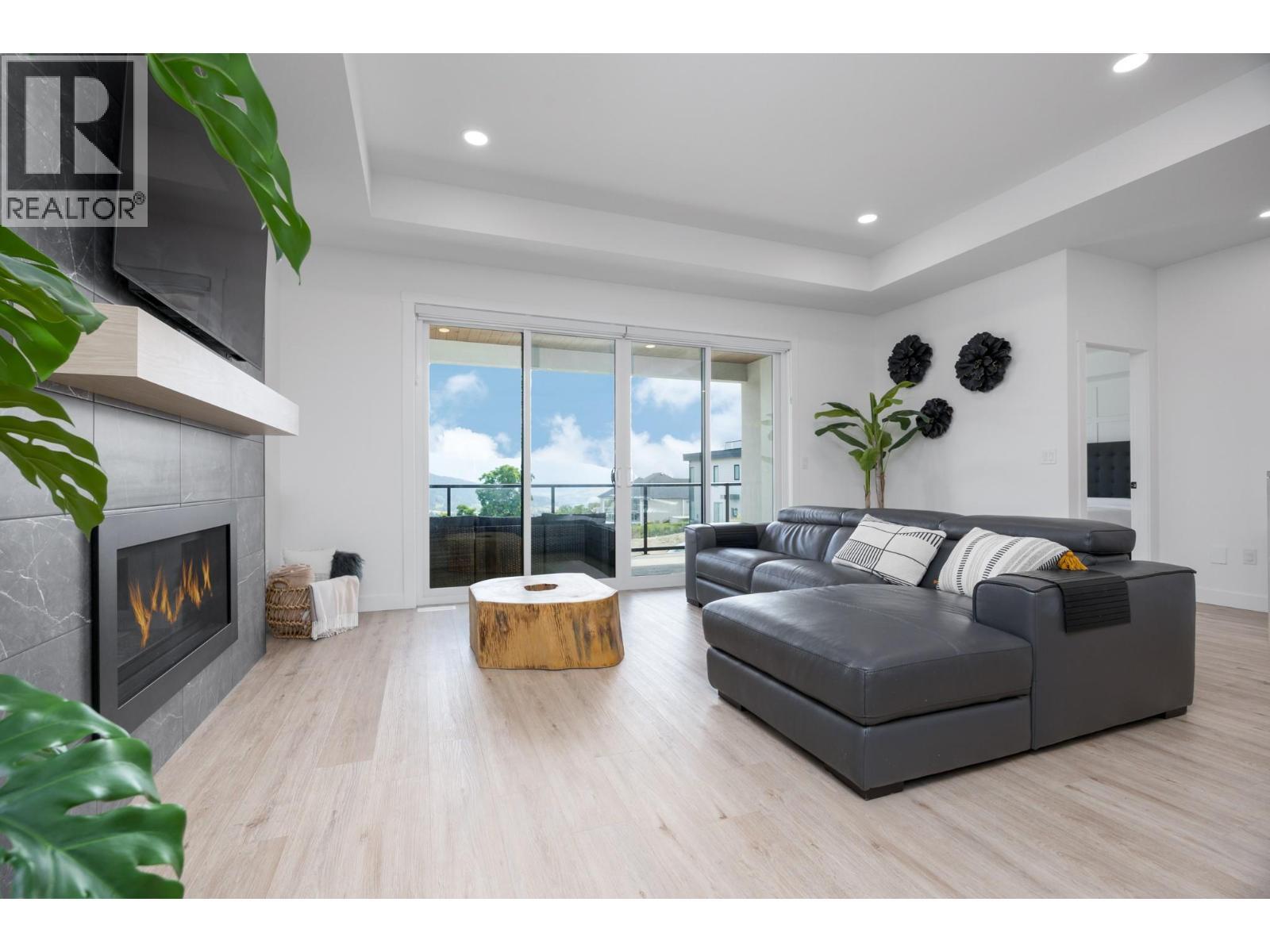 137 Whitefish Road, Vernon, BC - Indoor Photo Showing Living Room With Fireplace