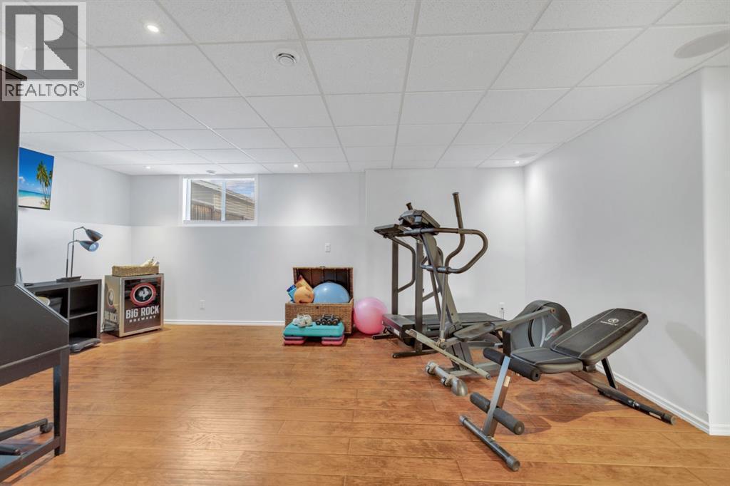 10 Wilkinson Circle, Sylvan Lake, AB - Indoor Photo Showing Gym Room