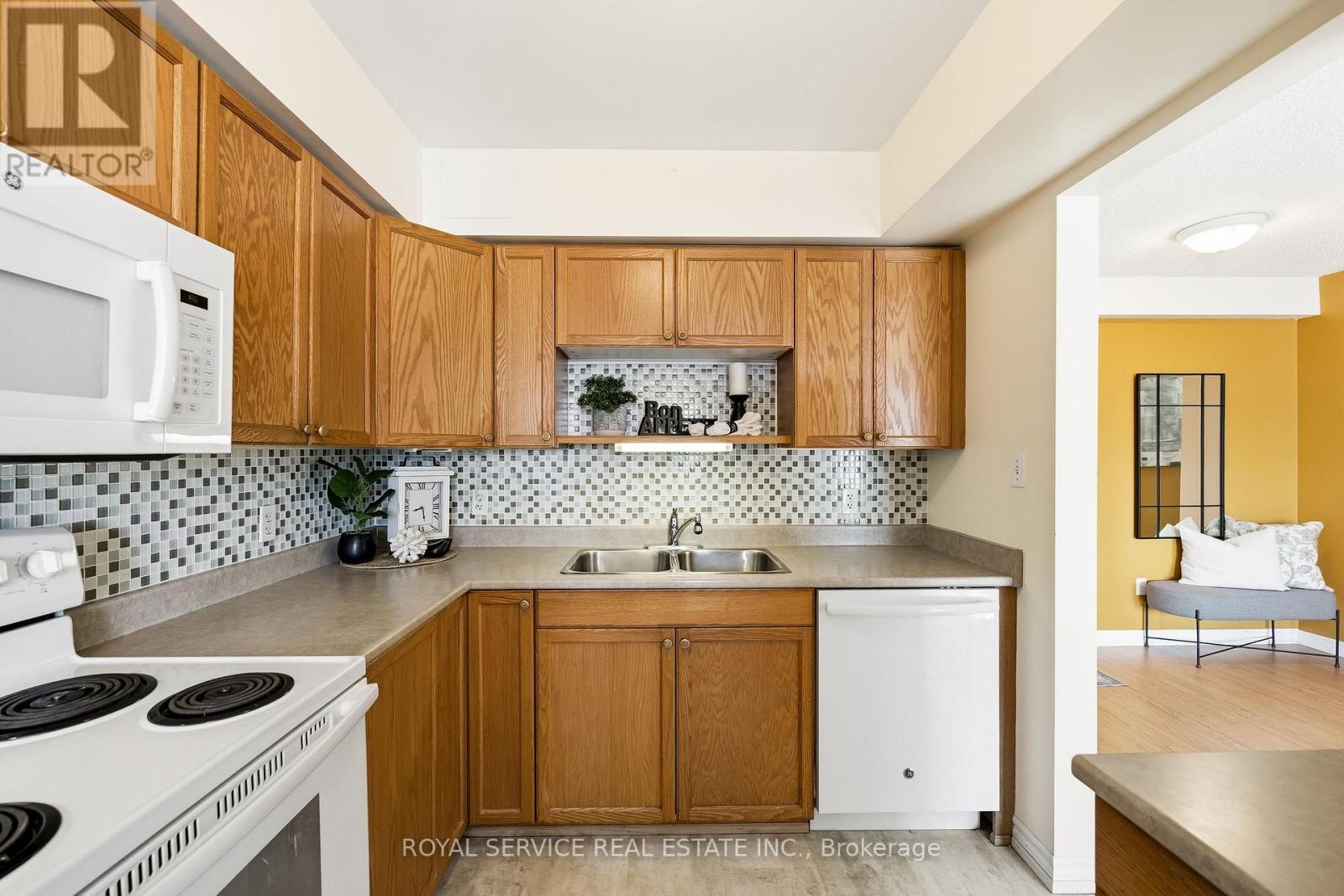 304 - 841 Battell Street, Cobourg, ON - Indoor Photo Showing Kitchen With Double Sink
