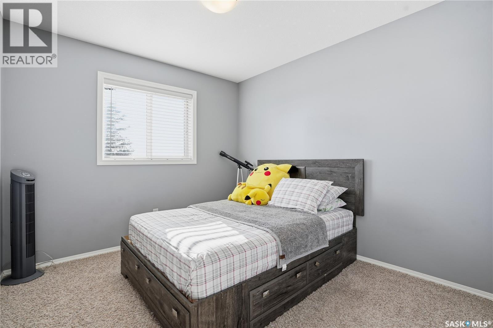18 4425 Nicurity Drive, Regina, SK - Indoor Photo Showing Bedroom