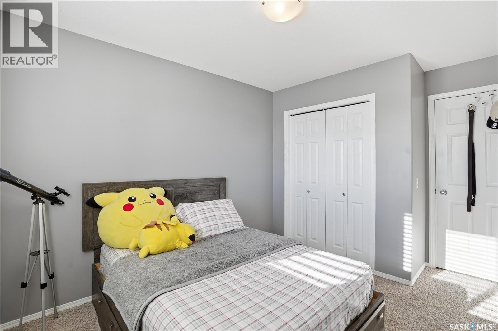 18 4425 Nicurity Drive, Regina, SK - Indoor Photo Showing Bedroom