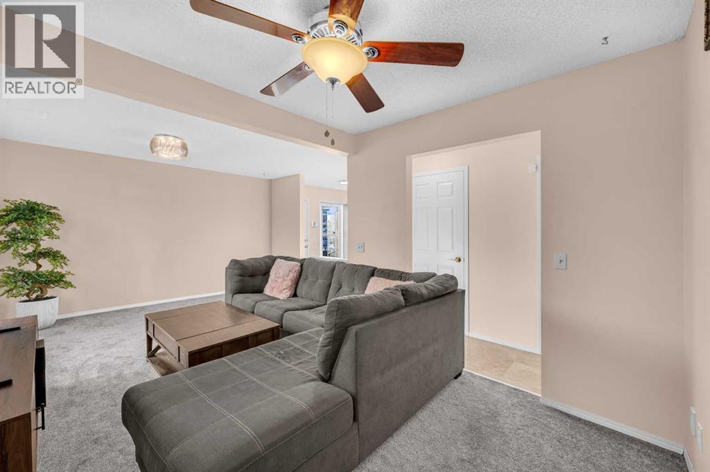 131 Coral Springs Circle Ne, Calgary, AB - Indoor Photo Showing Living Room