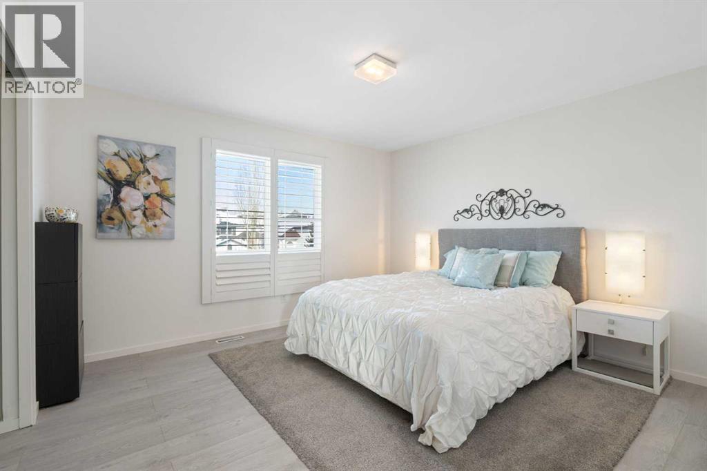 201 Harvest Creek Close Ne, Calgary, AB - Indoor Photo Showing Bedroom