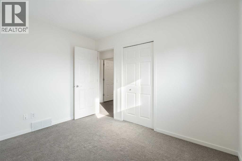 201 Harvest Creek Close Ne, Calgary, AB - Indoor Photo Showing Other Room