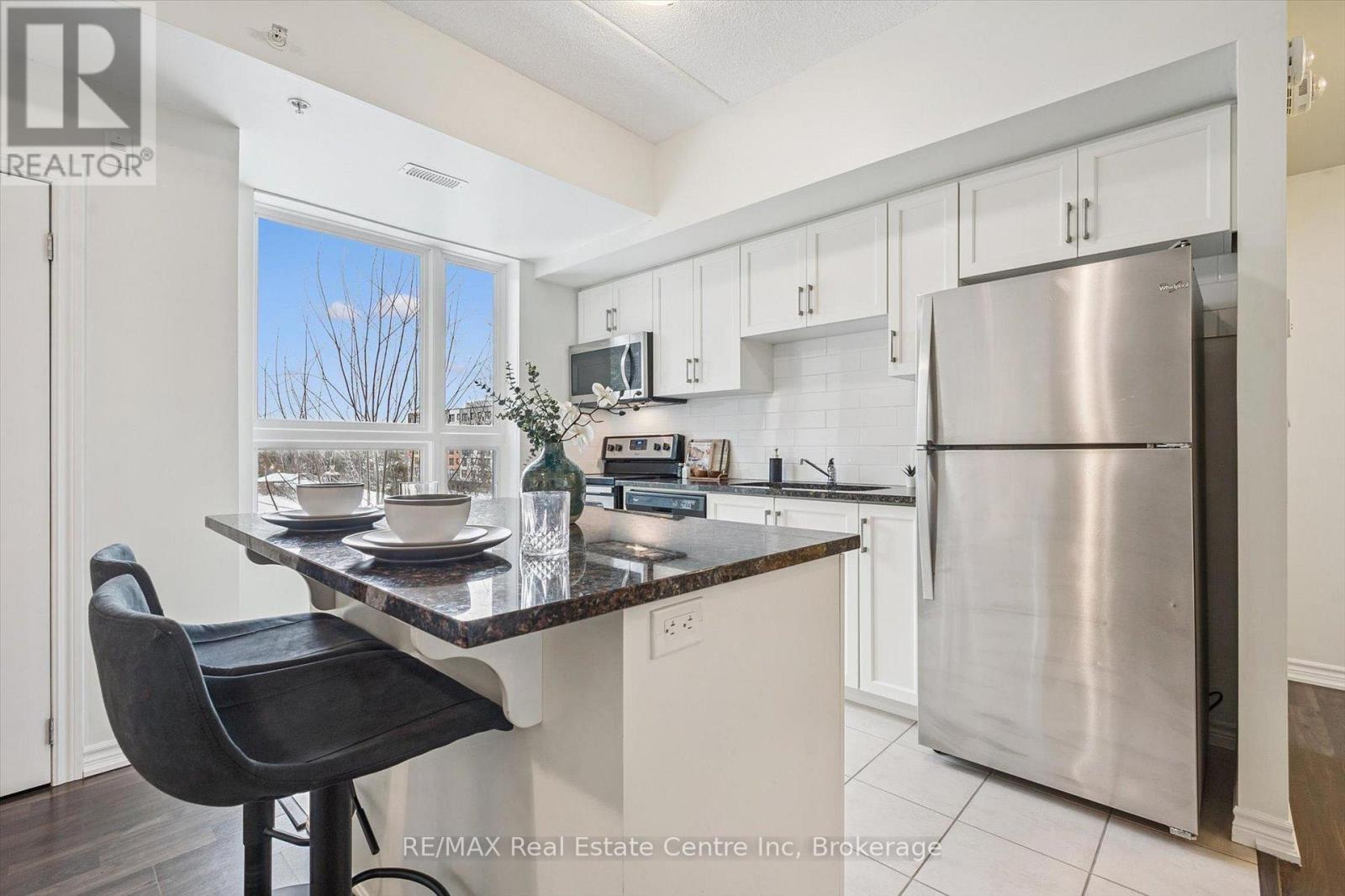 210 - 1280 Gordon Street, Guelph (Kortright East), ON - Indoor Photo Showing Kitchen