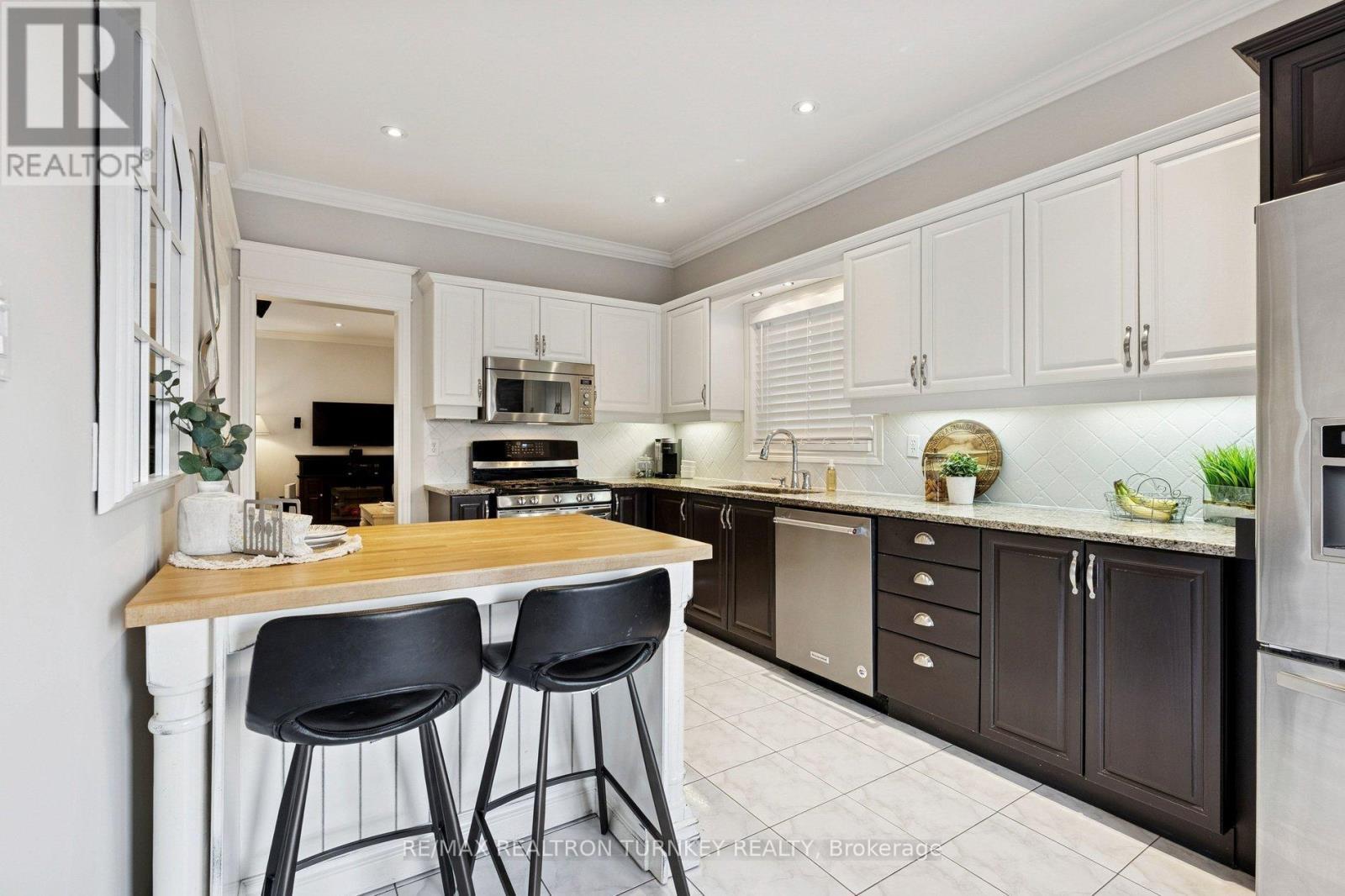 Butcher Block Breakfast Bar - 407 Seneca Court, Newmarket, ON - Indoor Photo Showing Kitchen With Upgraded Kitchen