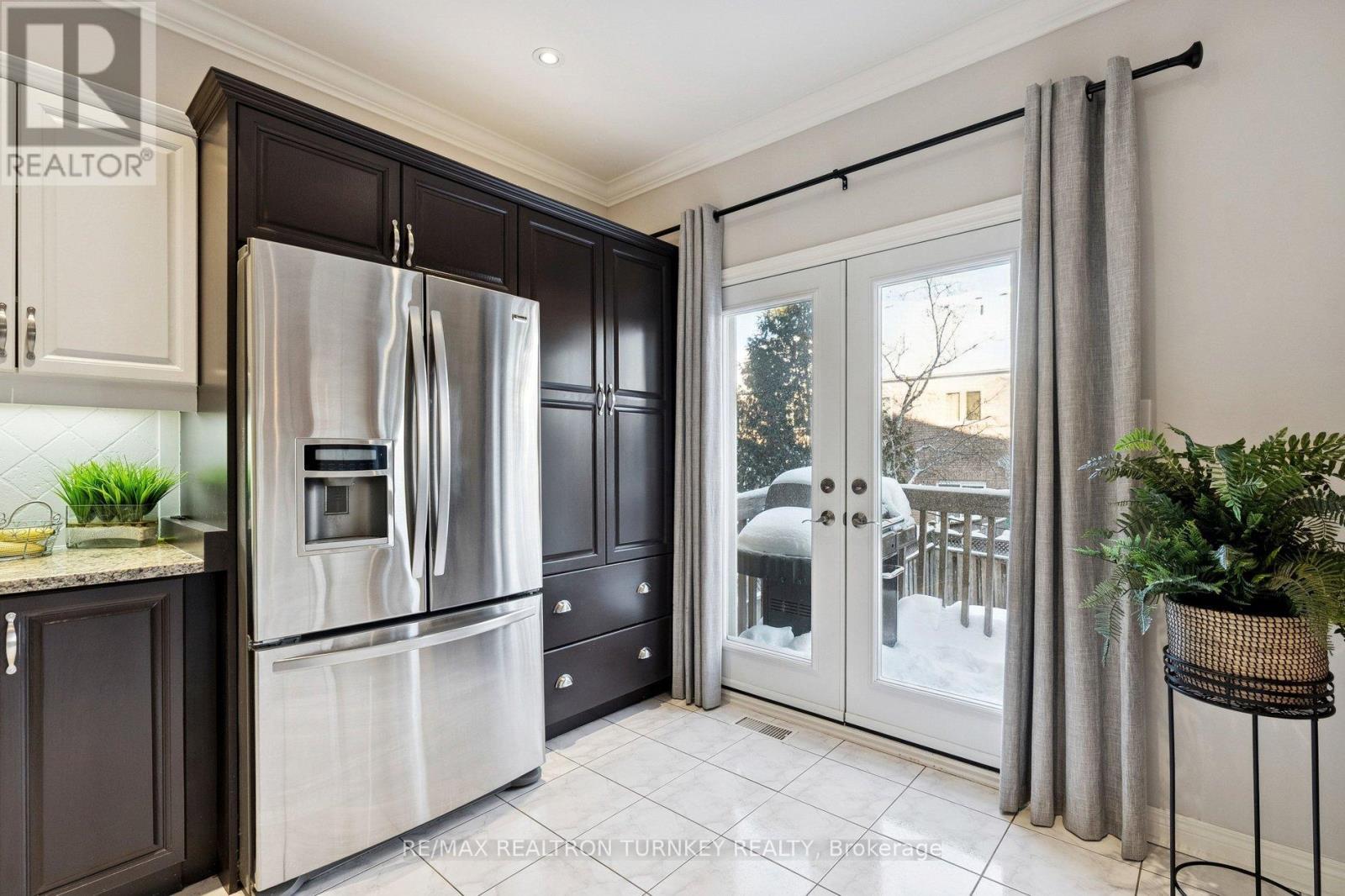 Pantry Cupboards and Upgraded Crown Moulding - 407 Seneca Court, Newmarket, ON - Indoor Photo Showing Kitchen