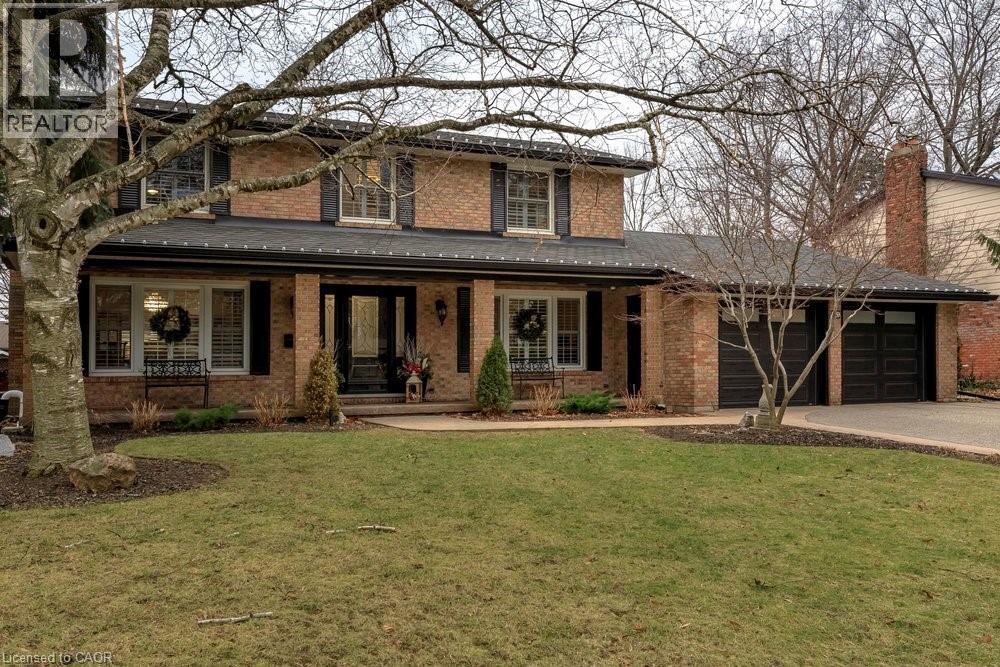 Beautifully positioned on this impressive 80'x153' lot. - 29 Woodside Drive, Hamilton, ON - Outdoor With Deck Patio Veranda With Facade