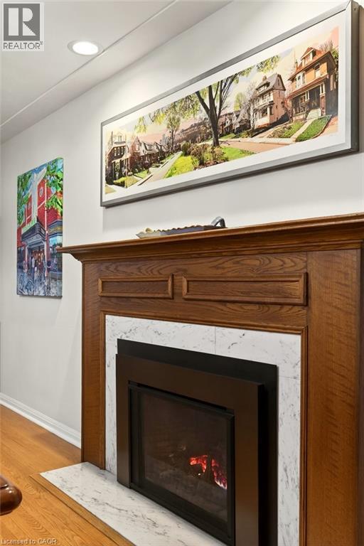 Lovely gas fireplace in the formal Dining room. - 29 Woodside Drive, Hamilton, ON - Indoor Photo Showing Living Room With Fireplace