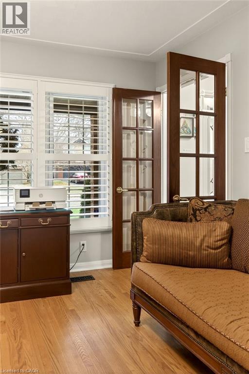 Home office with a french door entry for privacy and beautiful views overlooking the front yard trees and gardens - 29 Woodside Drive, Hamilton, ON - Indoor
