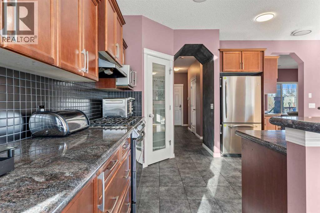 15 Chapalina Close Se, Calgary, AB - Indoor Photo Showing Kitchen With Upgraded Kitchen