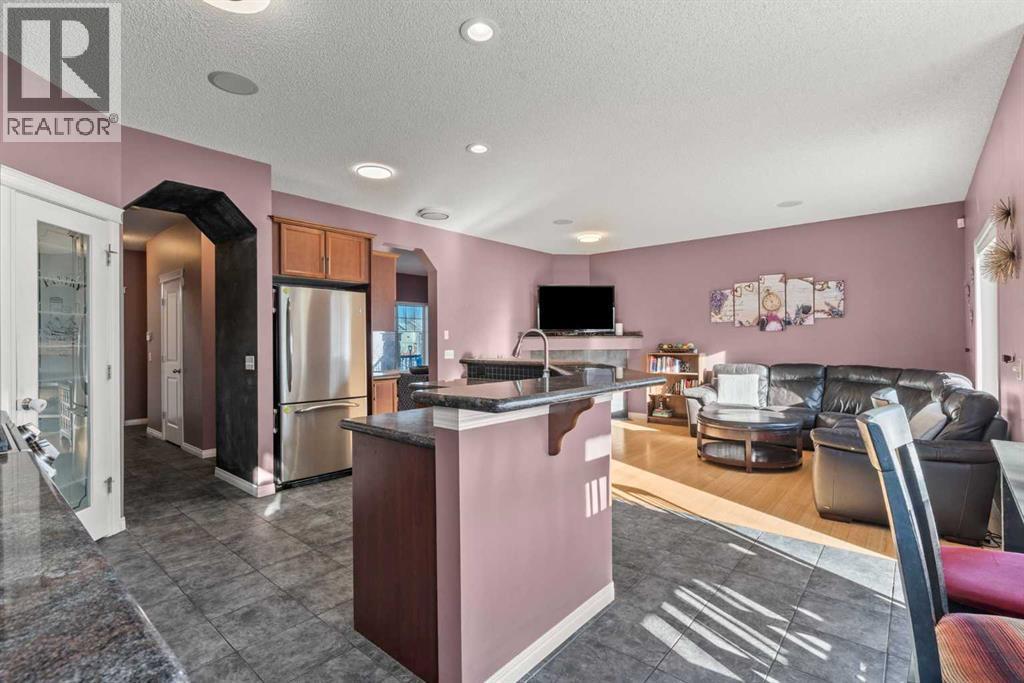 15 Chapalina Close Se, Calgary, AB - Indoor Photo Showing Kitchen With Stainless Steel Kitchen