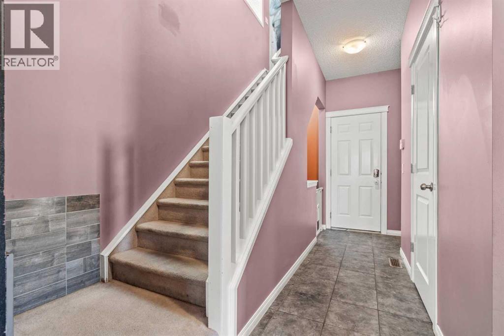 15 Chapalina Close Se, Calgary, AB - Indoor Photo Showing Other Room