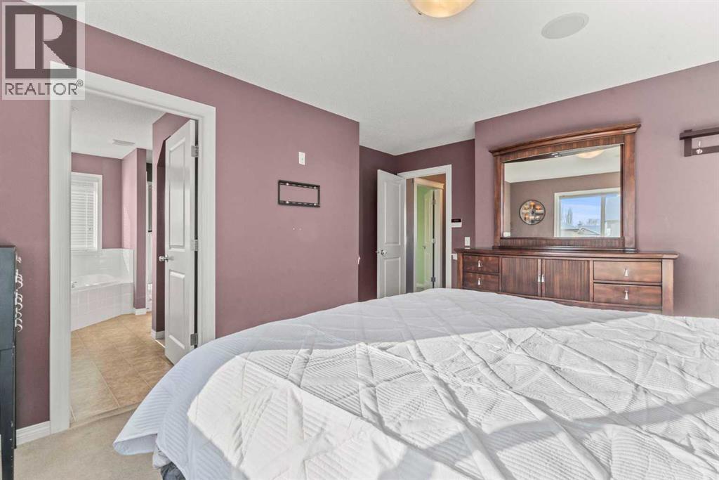 15 Chapalina Close Se, Calgary, AB - Indoor Photo Showing Bedroom