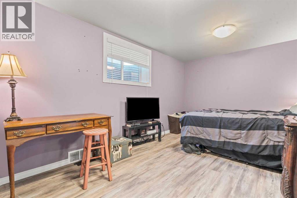15 Chapalina Close Se, Calgary, AB - Indoor Photo Showing Bedroom