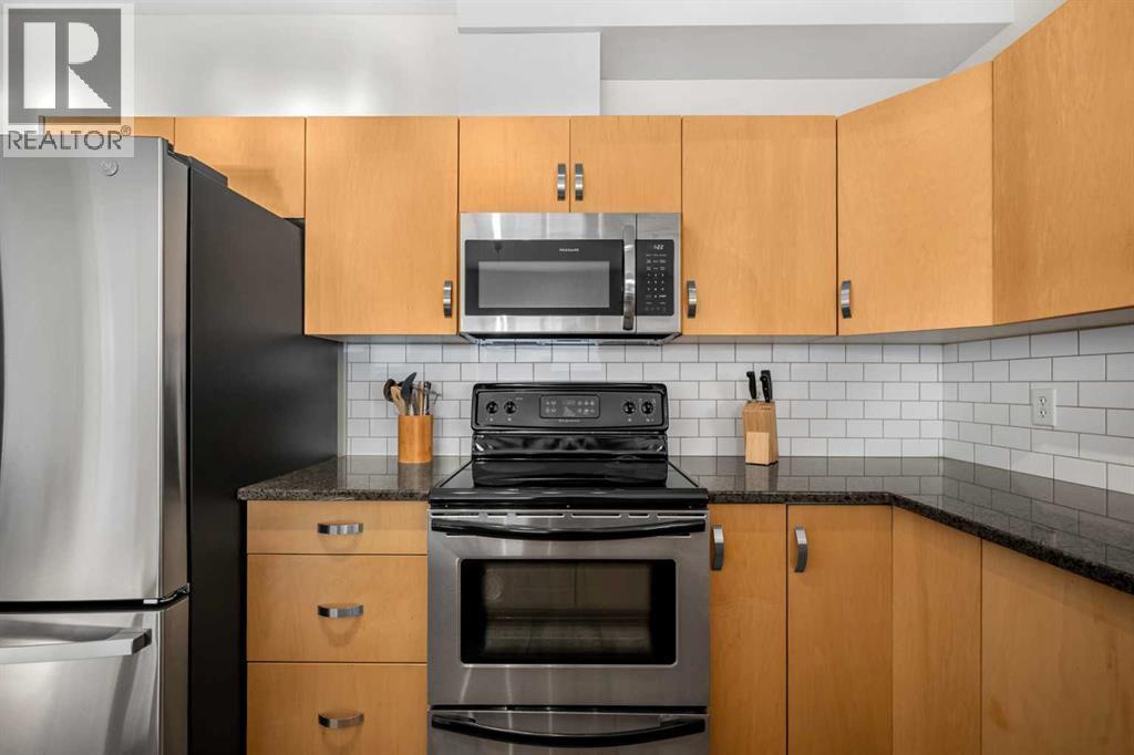 1101, 281 Cougar Ridge Drive Sw, Calgary, AB - Indoor Photo Showing Kitchen