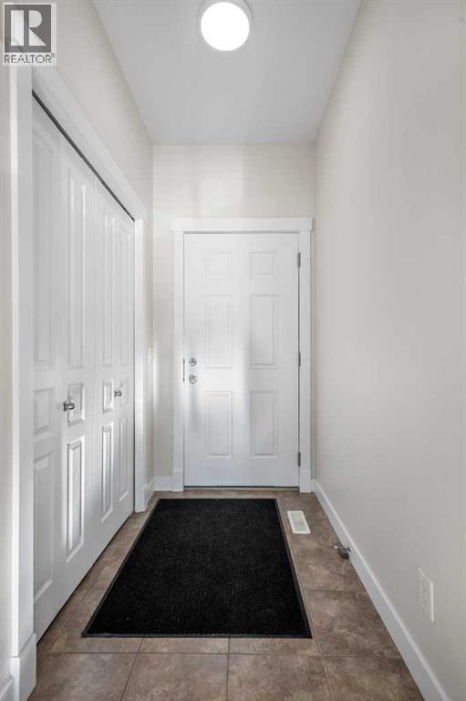 1101, 281 Cougar Ridge Drive Sw, Calgary, AB - Indoor Photo Showing Other Room