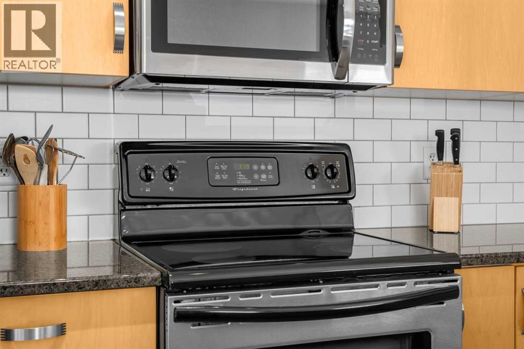 1101, 281 Cougar Ridge Drive Sw, Calgary, AB - Indoor Photo Showing Kitchen