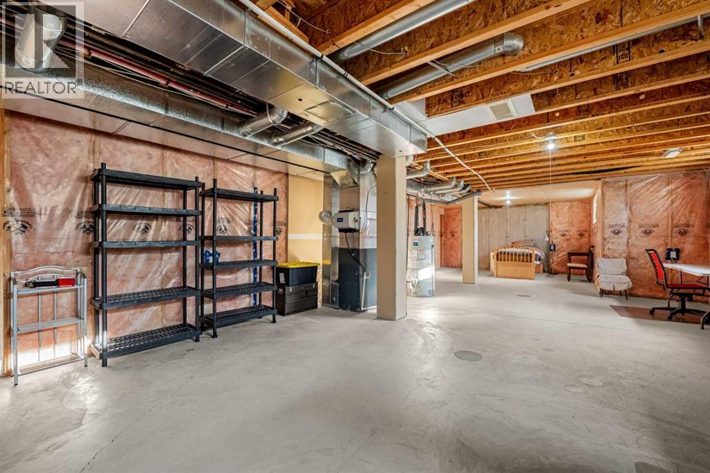 1101, 281 Cougar Ridge Drive Sw, Calgary, AB - Indoor Photo Showing Basement