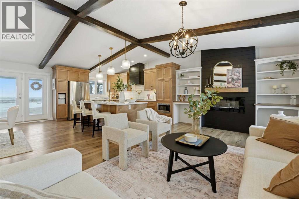 15 26534 Township Road 384, Rural Red Deer County, AB - Indoor Photo Showing Living Room With Fireplace