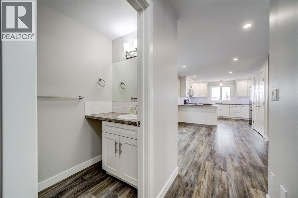 Hall with 2-Piece Bath - 203 1 Street, Shaughnessy, AB - Indoor