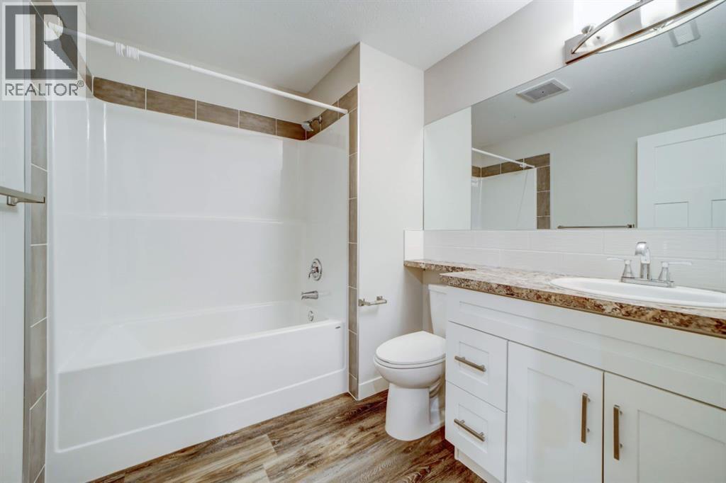 Basement 4-Piece Bathroom - 203 1 Street, Shaughnessy, AB - Indoor Photo Showing Bathroom