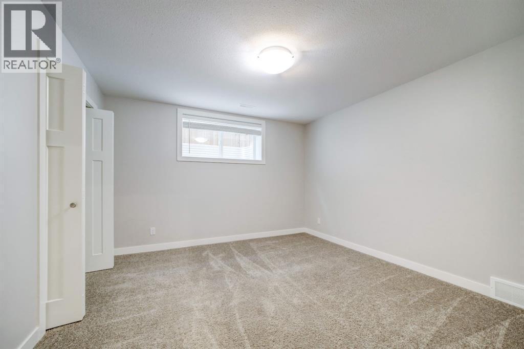 Basement Bedroom #2 - 203 1 Street, Shaughnessy, AB - Indoor Photo Showing Other Room