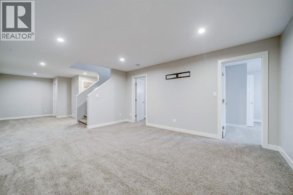 Rec Room + 2 Bedrooms - 203 1 Street, Shaughnessy, AB - Indoor Photo Showing Basement