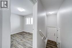 Bedroom and Hall to Garage -