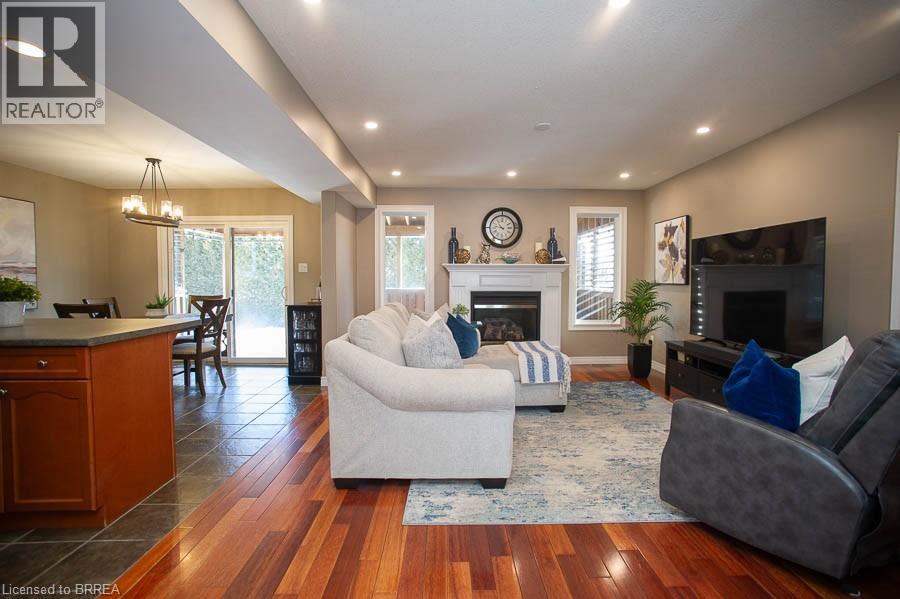 18 Gaal Court, Brantford, ON - Indoor Photo Showing Living Room With Fireplace