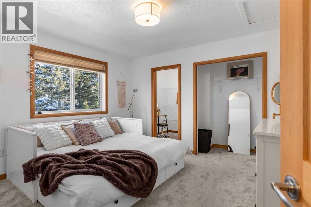 1712 11Th Avenue, Canmore, AB - Indoor Photo Showing Bedroom