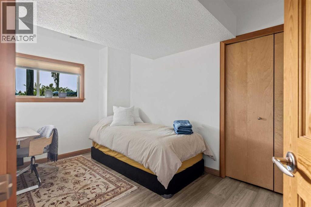 1712 11Th Avenue, Canmore, AB - Indoor Photo Showing Bedroom