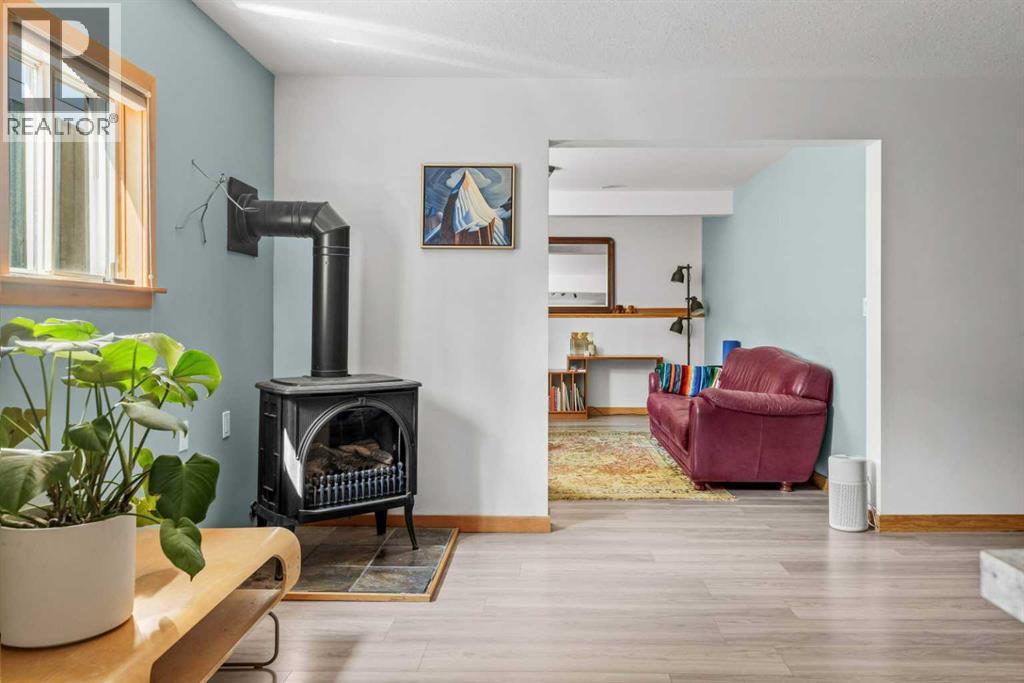1712 11Th Avenue, Canmore, AB - Indoor With Fireplace
