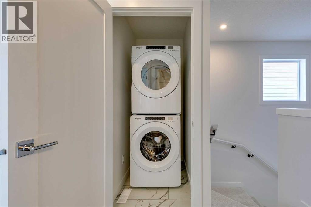646 Rangeview Street Se, Calgary, AB - Indoor Photo Showing Laundry Room