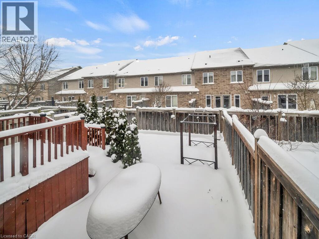 View of wooden balcony with a wooden deck and a residential view - 29 Amsterdam Crescent, Guelph, ON - Outdoor With Exterior