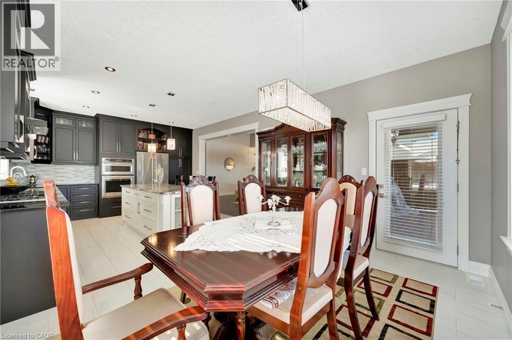 Dining room featuring recessed lighting and a textured ceiling - 107 Forbes Crescent, Listowel, ON - Indoor Photo Showing Dining Room