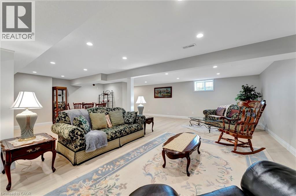 Living area with recessed lighting and baseboards - 107 Forbes Crescent, Listowel, ON - Indoor