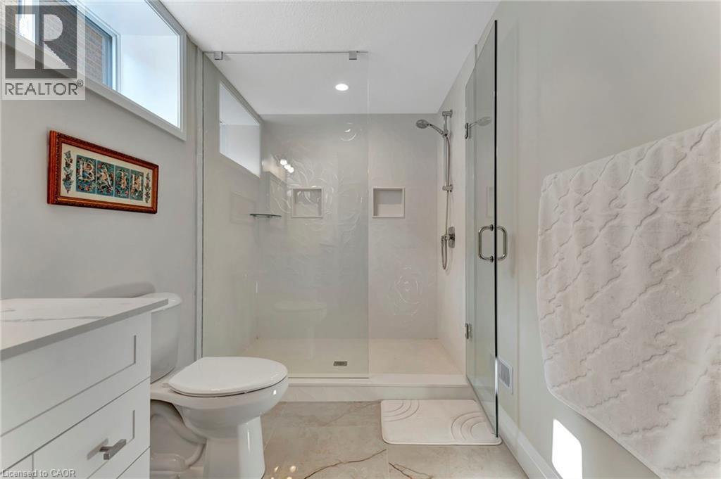 Full bathroom featuring a shower stall and vanity - 107 Forbes Crescent, Listowel, ON - Indoor Photo Showing Bathroom