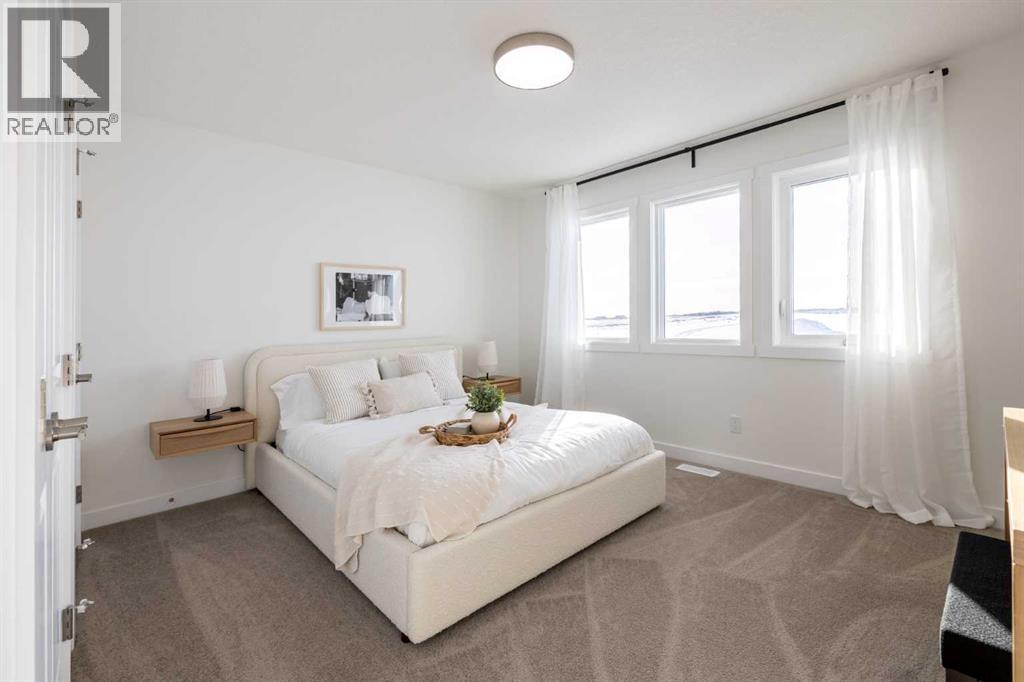 67 Appaloosa Way, Cochrane, AB - Indoor Photo Showing Bedroom