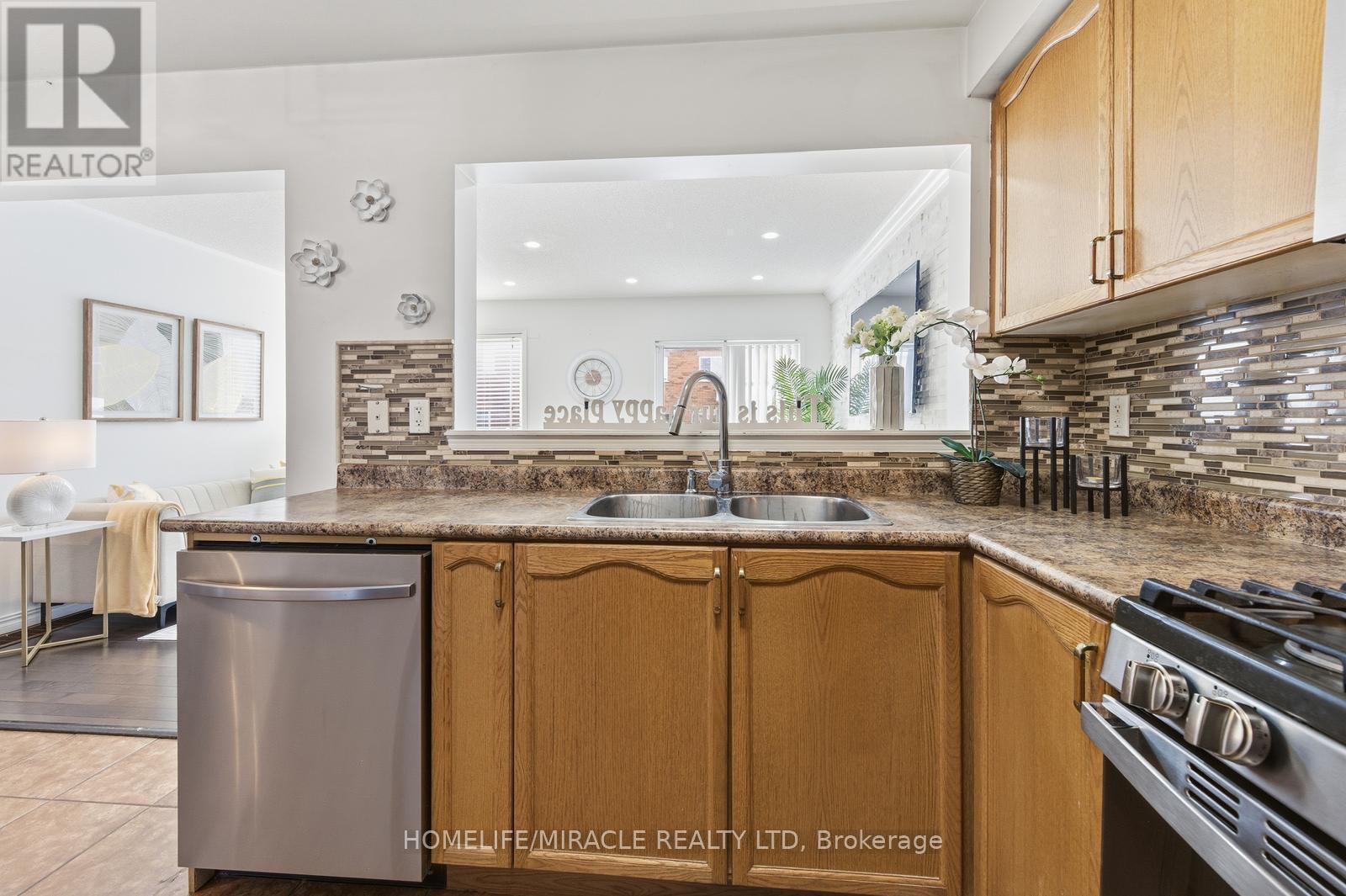 99 Spicebush Terrace, Brampton, ON - Indoor Photo Showing Kitchen With Double Sink