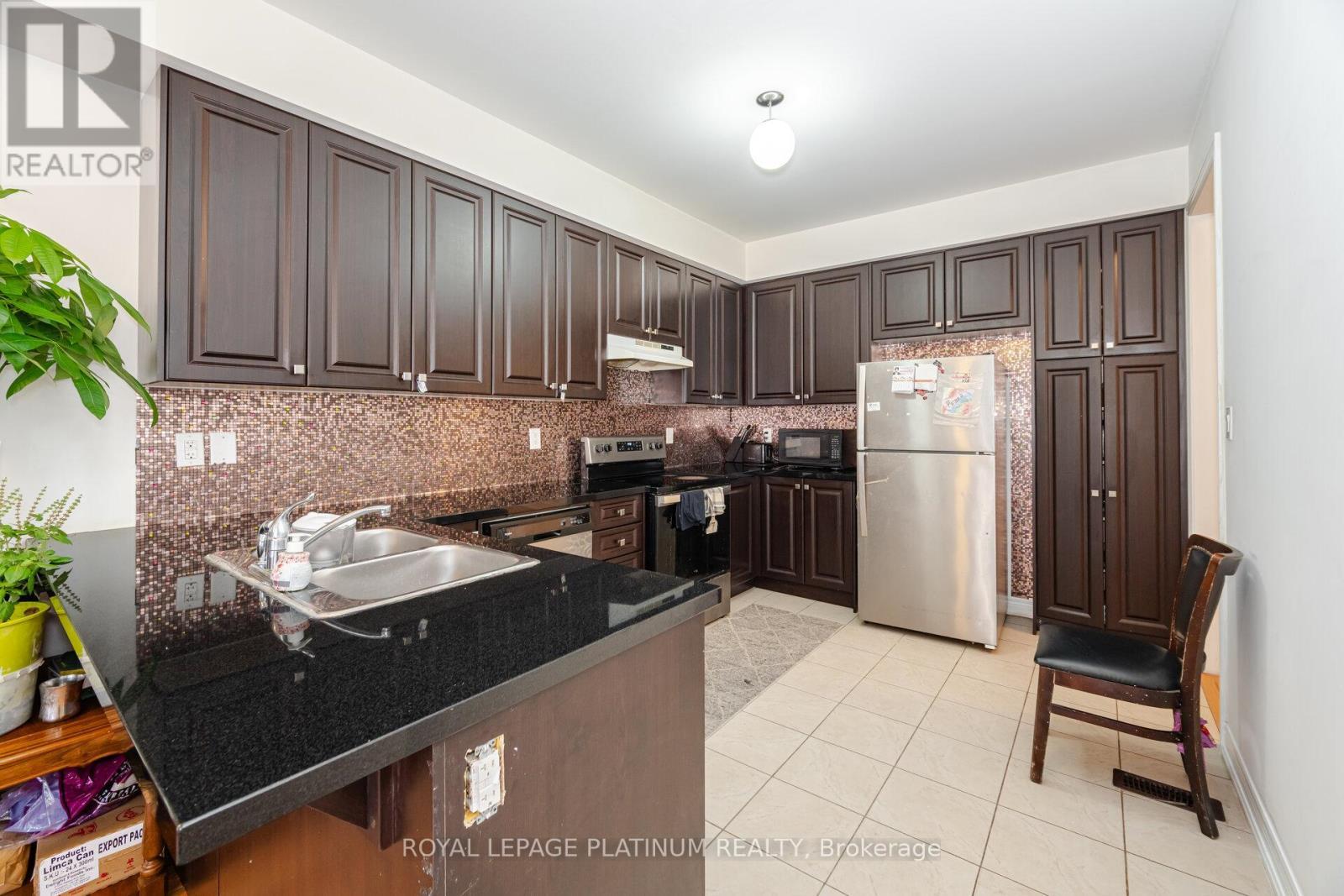 20 Haymarket Drive, Brampton, ON - Indoor Photo Showing Kitchen With Double Sink