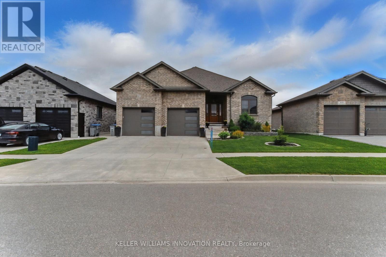 107 Forbes Crescent, North Perth, ON - Outdoor With Facade