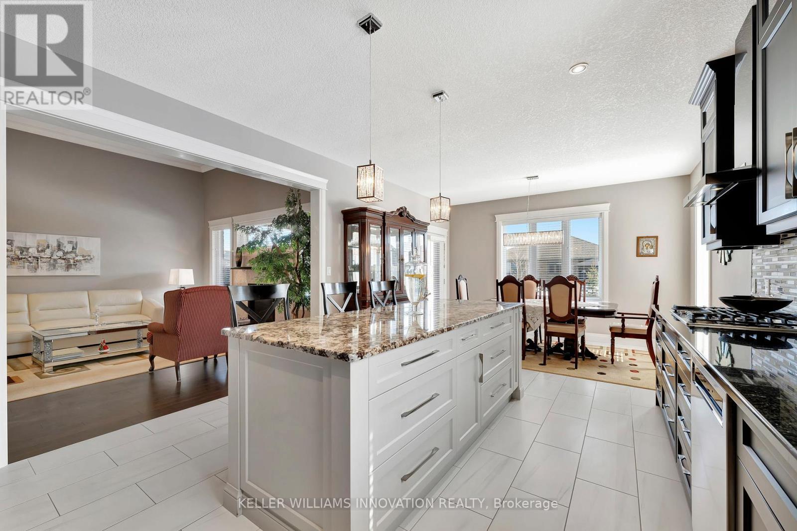 107 Forbes Crescent, North Perth, ON - Indoor Photo Showing Kitchen With Upgraded Kitchen