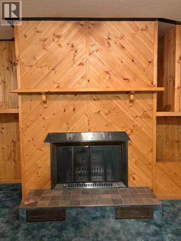 100 Balaclava Street, Veteran, AB - Indoor With Fireplace