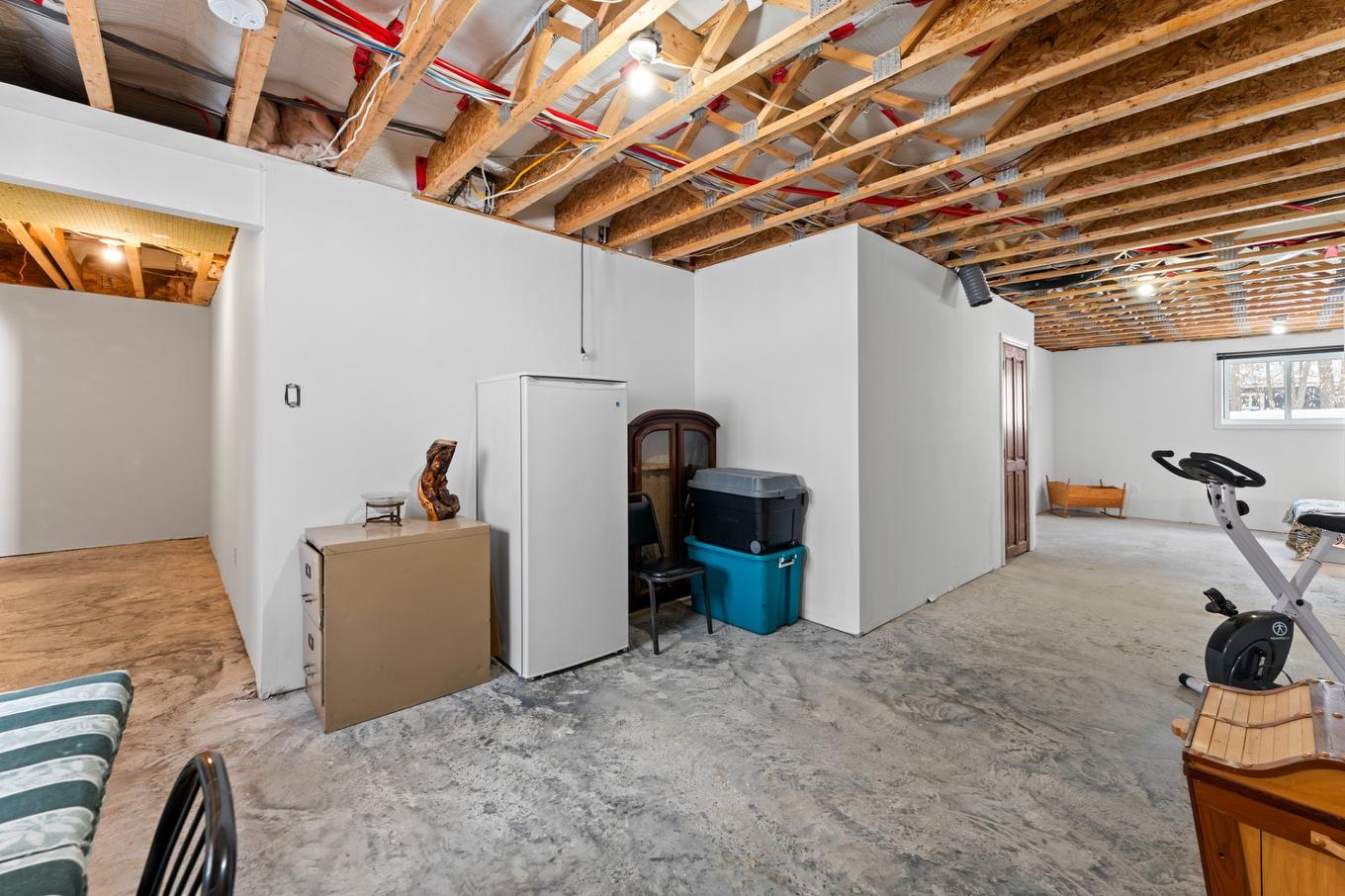 Salle familiale - 125 Rue Pascal, Sainte-Sophie, QC - Indoor Photo Showing Basement