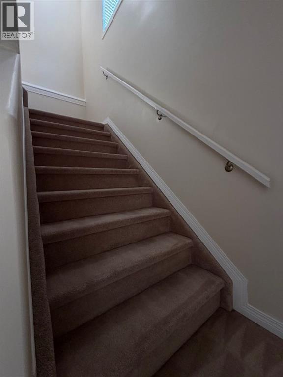 stairs ti 2nd floor - 234 Pacific Crescent, Fort Mcmurray, AB - Indoor Photo Showing Other Room