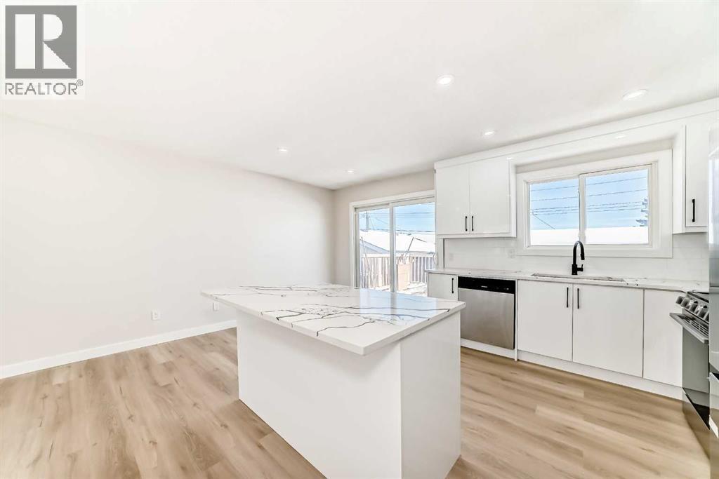 6128 Madigan Drive Ne, Calgary, AB - Indoor Photo Showing Kitchen With Upgraded Kitchen